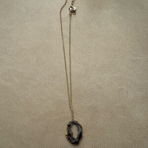 Elegant Gold and Black Pendant Necklace